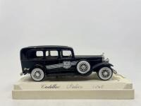 PACKARD: A group of 3&nbsp;1:43 scale models by Solido including a Packard Super Eight Cabriolet, a Cadillac police car and a Duesenberg&nbsp;Model J, all in original display cases. [Location: Sydney] - 5