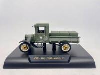 MILITARY:&nbsp;A group of 3 models including a 1:43 1920 Rolls Royce Armoured Car by&nbsp;Matchbox with original packaging, a&nbsp;Battle Kings K106 Truck with tank&nbsp;by Matchbox (no packaging) and a 1:32 1923 Ford Model T US Army truck by Signature models. [Location: Syd - 7