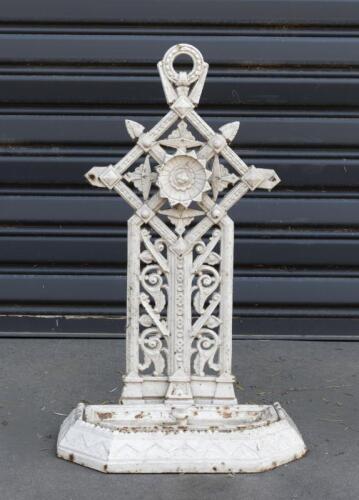 UMBRELLA STAND: An antique cast-iron umbrella stand