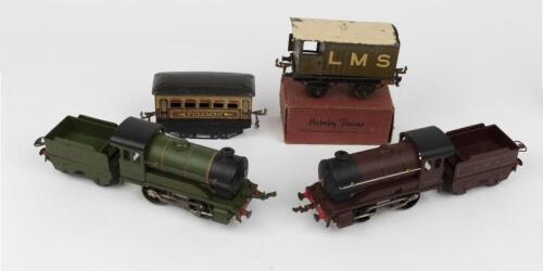 TRAINS: A Hornby '0' Gauge LMS 0-4-0 560 engine and tender