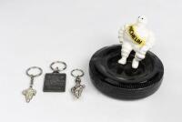 MICHELIN: A modern ceramic figure of an early Bibendum on tyre desk piece
