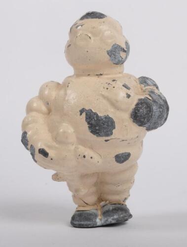 22 · MICHELIN: A rare early lead Michelin Bibendum 'Babe' figure, approximately 10cm high