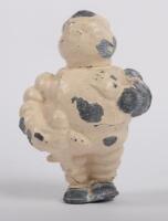 MICHELIN: A rare early lead Michelin Bibendum 'Babe' figure, approximately 10cm high