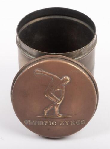 51 · OLYMPIC TYRES: An excellent Olympic Tyres vulcanizing/patch repair tin with embossed lid with logo and brand name, made by Stokes & Sons Melbourne, c1950s. 7.5cm high, 8cm wide