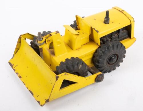 52 · BOOMAROO: A c1960s Australian made Boomaroo tin toy bull dozer in yellow, approximately 27cm long