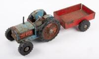 BOOMAROO: A c1960s Australian made Boomaroo tin toy tractor with trailer, 51cm long overall