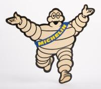 MICHELIN: A Michelin, hard plastic, Bibendum hanging shop display piece, with Bibendum in outward arms pose, 28cm high, 32.5cm wide