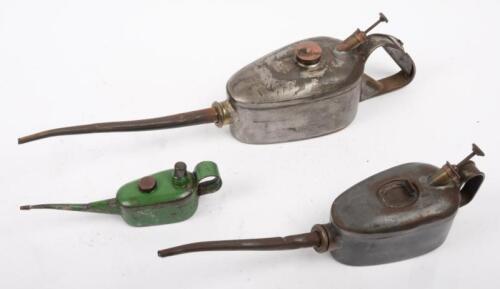 61 · OILERS: A group of three oilers of various sizing, two stamped 'Made in Australia', largest 42cm long