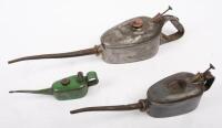 OILERS: A group of three oilers of various sizing, two stamped 'Made in Australia', largest 42cm long