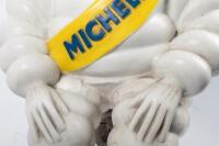 MICHELIN: A large seated Michelin Bibendum figure on base, with modern hanging bracket, Figure approximately 59cm high - 4