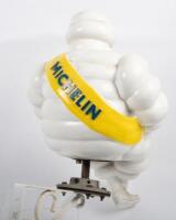 MICHELIN: A large seated Michelin Bibendum figure on base, with modern hanging bracket, Figure approximately 59cm high - 7
