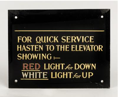 ELEVATOR: An antique reverse painted bevelled edge glass elevator sign