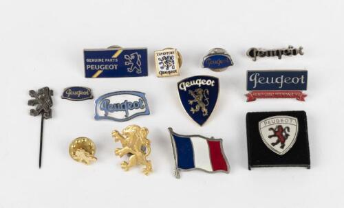 PEUGEOT: A collection of small Peugeot lapel badges and pins