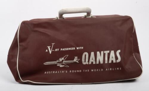 141 · QANTAS: A small 'Qantas Australian's Round The World Airline' carry on bag, measures 22cm high by 43cm wide
