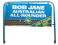 BOB JANE: A Bob Jane tyre shop sign with stand 'Bob Jane Australian All-Rounder - Over 2 Million Sold', 80cm high, 95cm wide