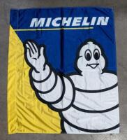 MICHELIN: A cloth Michelin flag featuring Bibendum; banner with dimensions of 118cm wide, 136cm high overall.