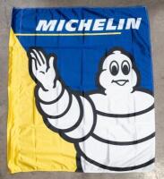 MICHELIN: A cloth Michelin flag featuring Bibendum; banner with dimensions of 118cm wide, 136cm high overall.