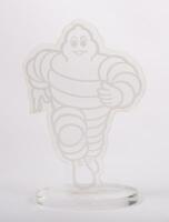 MICHELIN: A perspex Michelin Bibendum&nbsp;figural desk piece, featuring running Bibendum, 27cm high