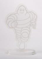 MICHELIN: A perspex Michelin Bibendum&nbsp;figural desk piece, featuring running Bibendum, 27cm high - 2