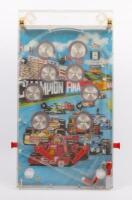 PIN BALL MACHINE: A c1970s vintage Hong Kong made Grand Prix themed plastic table top pin ball machine, 50cm high, 27cm wide