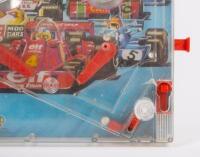 PIN BALL MACHINE: A c1970s vintage Hong Kong made Grand Prix themed plastic table top pin ball machine, 50cm high, 27cm wide - 2