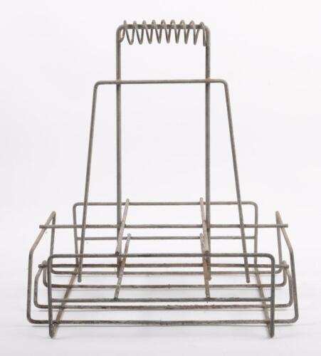 BASKET: A six bottle wire basket, as suited to oil bottles or milk bottles, 40cm high, 35.5cm wide, 25cm deep
