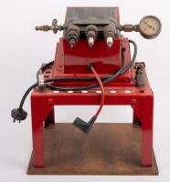 CHAMPION: A Champion Spark Plugs workshop testing and servicing unit, mounted to a timber base, 42cm high, 35cm wide overall - 5
