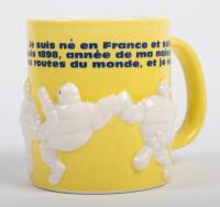 MICHELIN: An official Michelin ceramic mug with raised Bibendums&nbsp;in various positions, French text