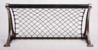 LUGGAGE RACK: An early luggage rack with wire netting, likely&nbsp;used within a train or tram, 30.5cm high, 66cm wide, 31cm deep