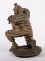 MICHELIN: A high quality reproduction brass Michelin Bibendum radiator mascot, approx 11.5cm high - 3