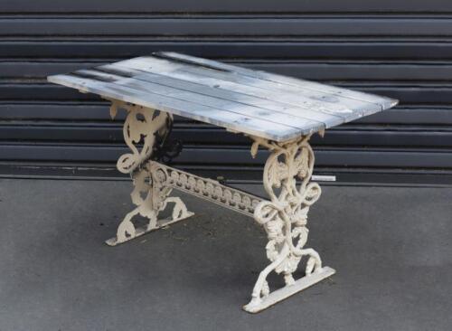 OUTDOOR: An antique cast-iron garden table