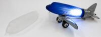 DC3 AIRPLANE LAMP: An Art Deco styled lamp in the form of a Douglas DC3 airplane, featuring interchangeable shades (Blue and Frosted White) believed to be a reproduction after the&nbsp;Sarsaparilla designs lamps. Measures approximately 34cm in length, 33cm wid
