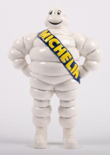 MICHELIN: A modern reproduction ceramic Michelin standing Bibendum figure, 29cm high