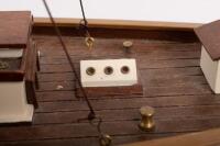 YACHT: A wooden model of an early sailing yacht with large fabric sails, approximately&nbsp;84cm in length, 83cm high, comes with a stand for base - 4