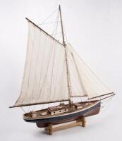 YACHT: A wooden model of an early sailing yacht with large fabric sails, approximately&nbsp;84cm in length, 83cm high, comes with a stand for base - 6
