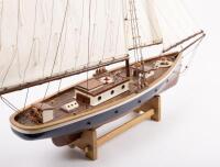 YACHT: A wooden model of an early sailing yacht with large fabric sails, approximately&nbsp;84cm in length, 83cm high, comes with a stand for base - 7