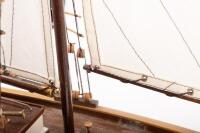 YACHT: A wooden model of an early sailing yacht with large fabric sails, approximately&nbsp;84cm in length, 83cm high, comes with a stand for base - 10
