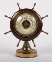 BAROMETER: A barometer in the form of a ships wheel, marked to face 'Made In Western Germany' approximately 16cm high overall