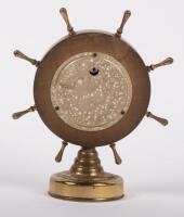 BAROMETER: A barometer in the form of a ships wheel, marked to face 'Made In Western Germany' approximately 16cm high overall - 2