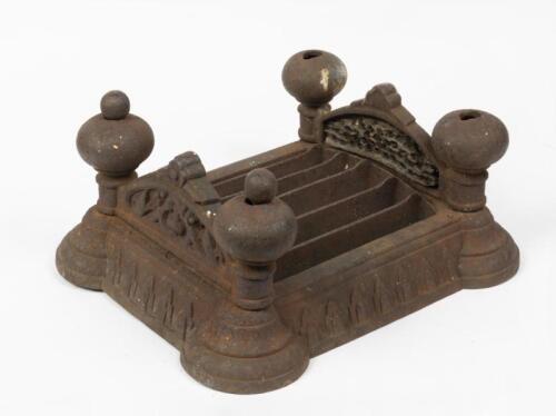 15 · BOOT SCRAPER: A large 19th century Gothic Revival cast iron boot scraper
