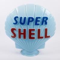 SHELL: A c1960s 'Super Shell' blue glass petrol pump globe, manufactured by Hailware, measures approximately 45cm high, 43cm wide