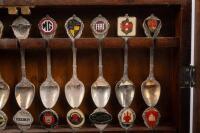 COLLECTOR CAR SPOONS: A&nbsp;collection of vintage car logo motifs attached to spoons circa 1985, in display case&nbsp; - 7