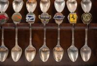 COLLECTOR CAR SPOONS: A&nbsp;collection of vintage car logo motifs attached to spoons circa 1985, in display case&nbsp; - 9