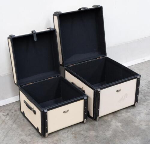 169 · LUGGAGE TRUNKS: A pair of modern timber bound luggage trunks