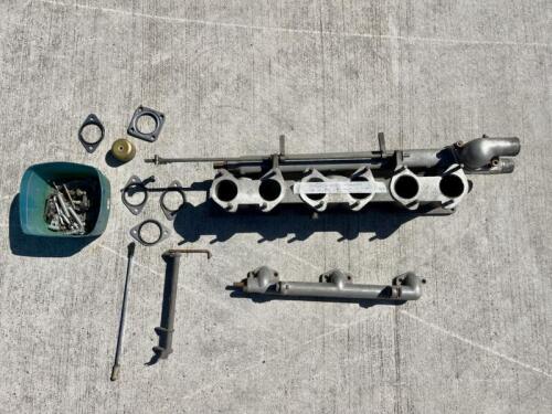 JAGUAR: A triple Weber carburettor setup for 3.8 Jaguars (E-Type, Mark II, etc). [Location: Sydney]