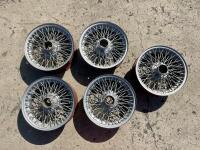 AUSTIN-HEALEY: A set of 5, 60 spoke wire wheels measuring 5 x 15", to suit later 6 cylinder Healey models and other british sports cars. [Location: Sydney]