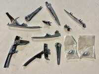 AUSTIN-HEALEY: A large group of Austin-Healey body hardware including hinges and handles. [Location: Sydney]