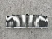 AUSTIN-HEALEY: A grille centre, to suit 3000 MKII and MKIII models, unused. [Location: Sydney]