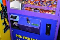 'Win N&nbsp;Grin' Cadbury Favorites branded large claw machine,&nbsp;prizes included may not represent photos by the close of the auction - 2