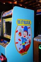 'Fix It Felix Jr' game within repoduction Nintendo cabinet, inspired by Wreck It Ralph - 3